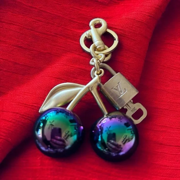 Louis Vuitton lock and key on a Multicolor Cherry Keychain - Picture 1 of 3